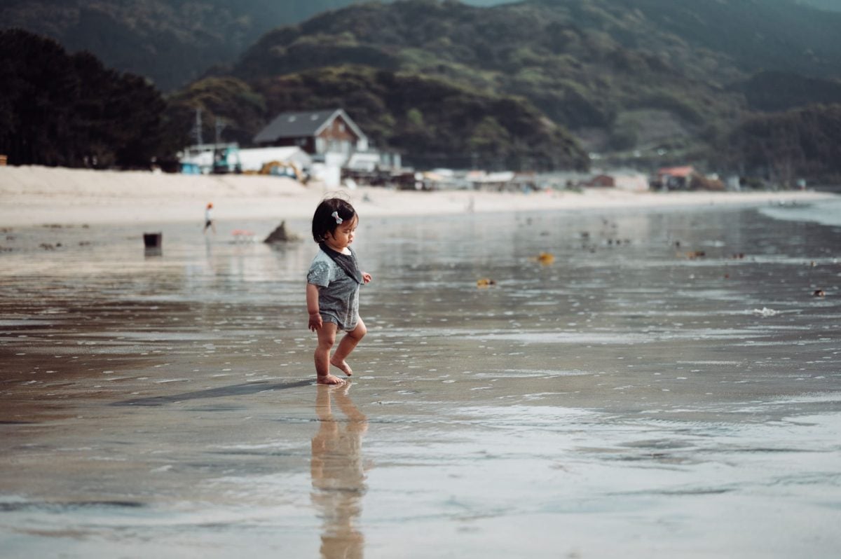 Portrait of baby at a beach.