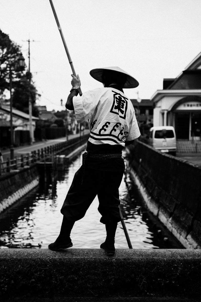 street photo of Yanagawa boat man