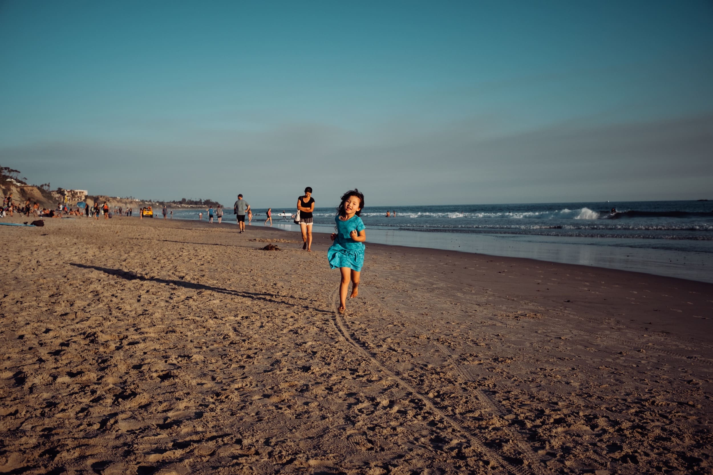 Girl runs at beach