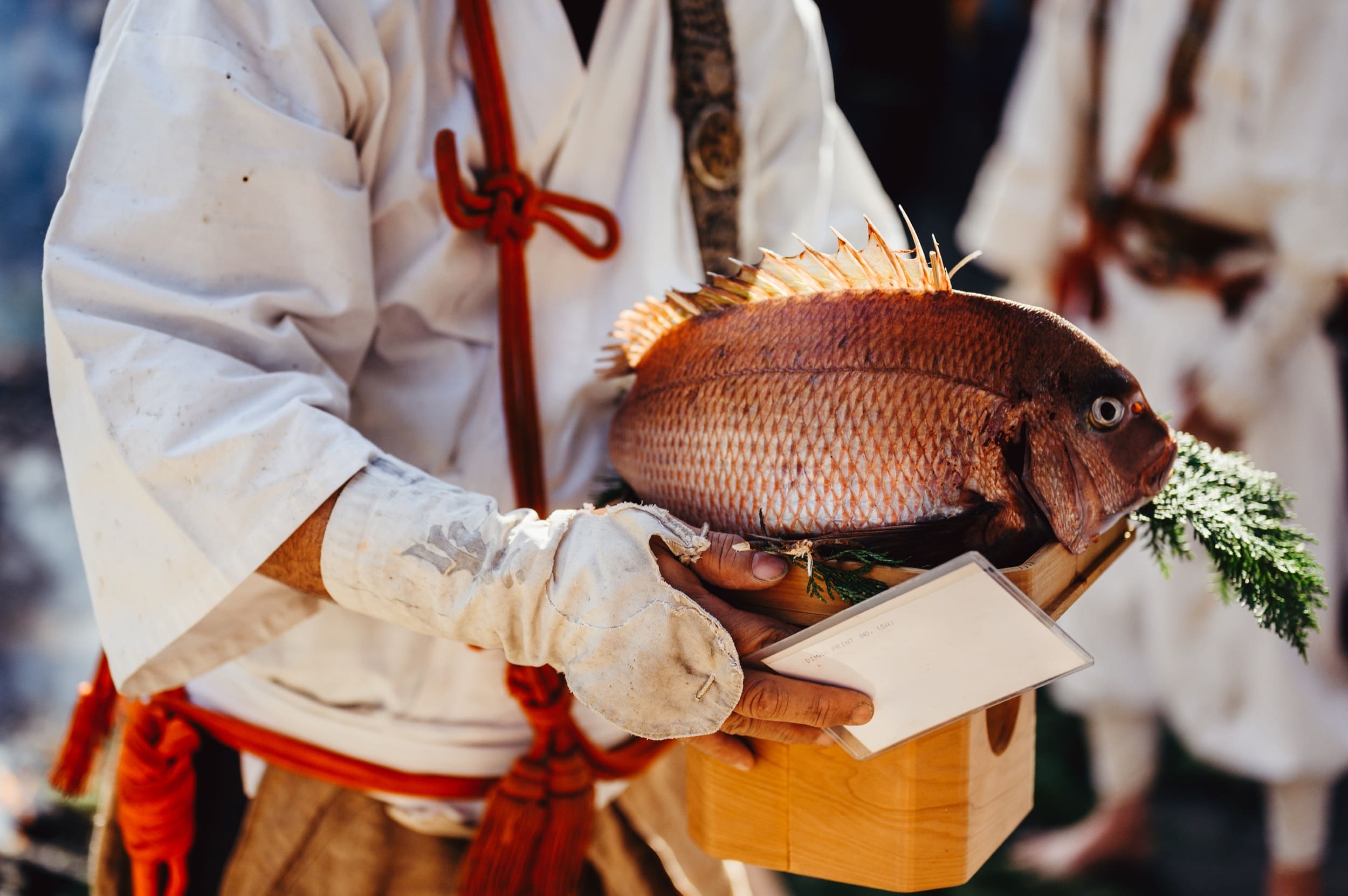 Monk holds red snapper