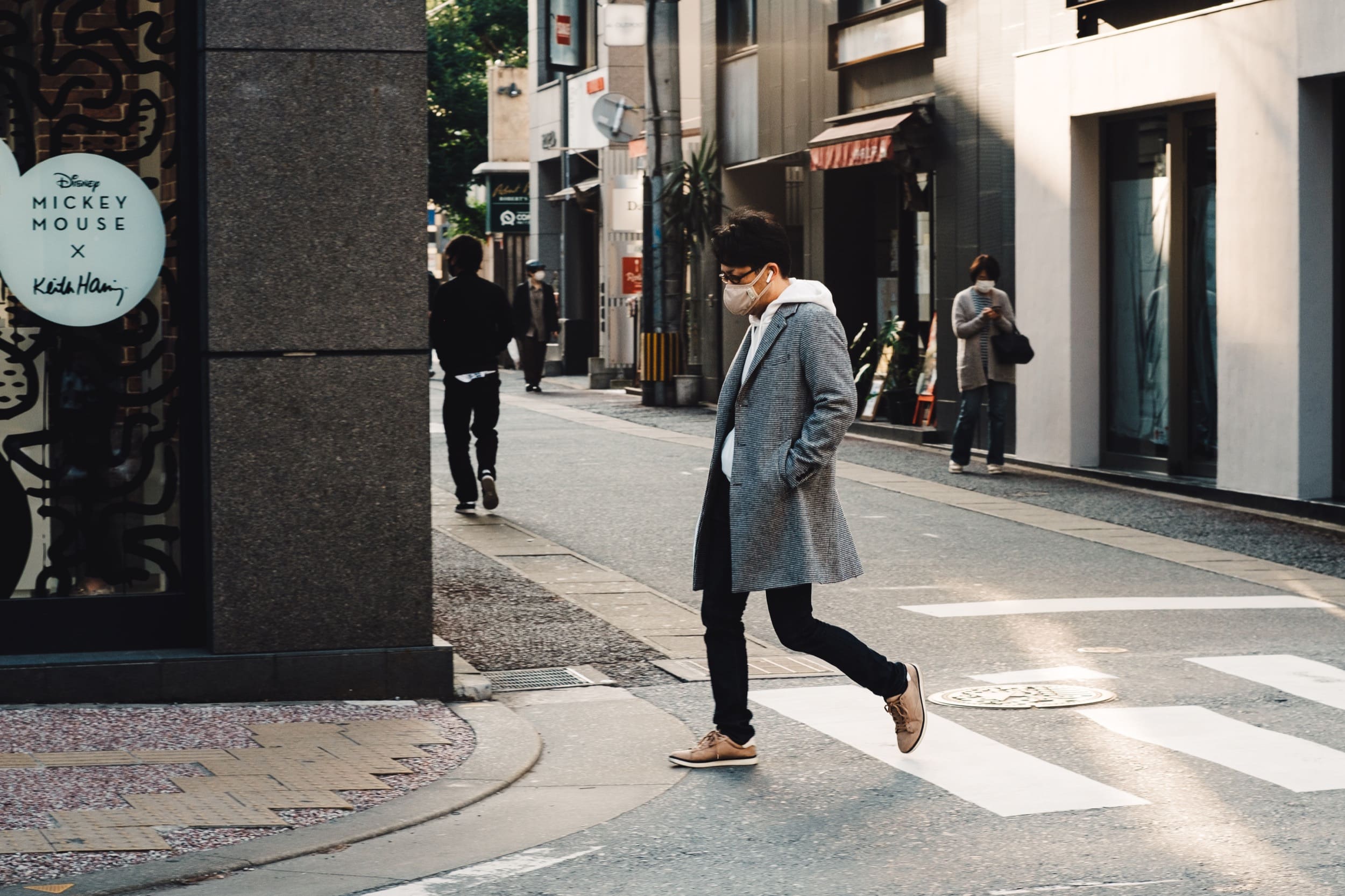TTArtisan 50mm f1.2 Street Photography Sample of a man walking in Tenjin