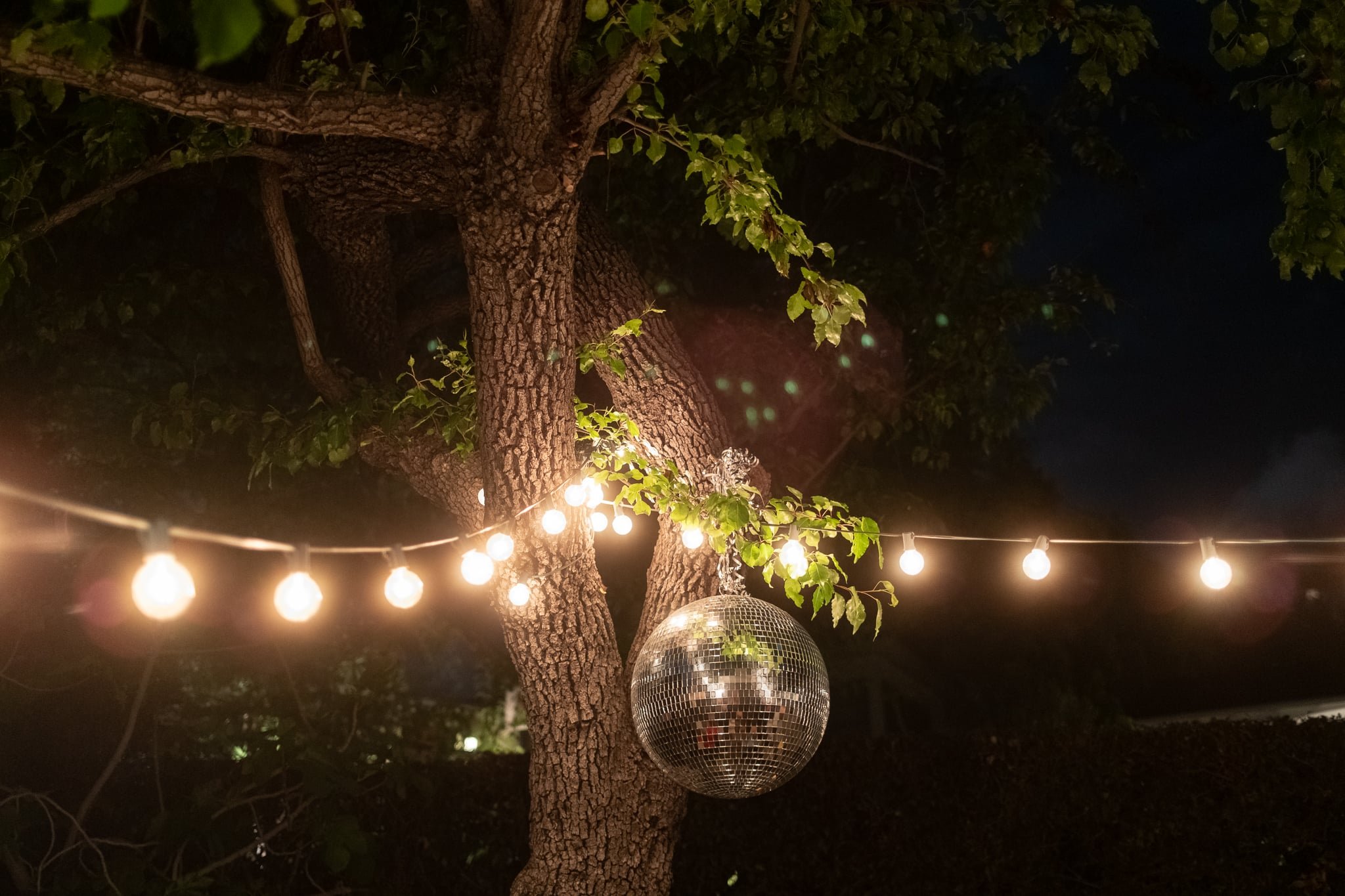 Led overhead lights blooming and creating ghosting, with a Disco Ball.